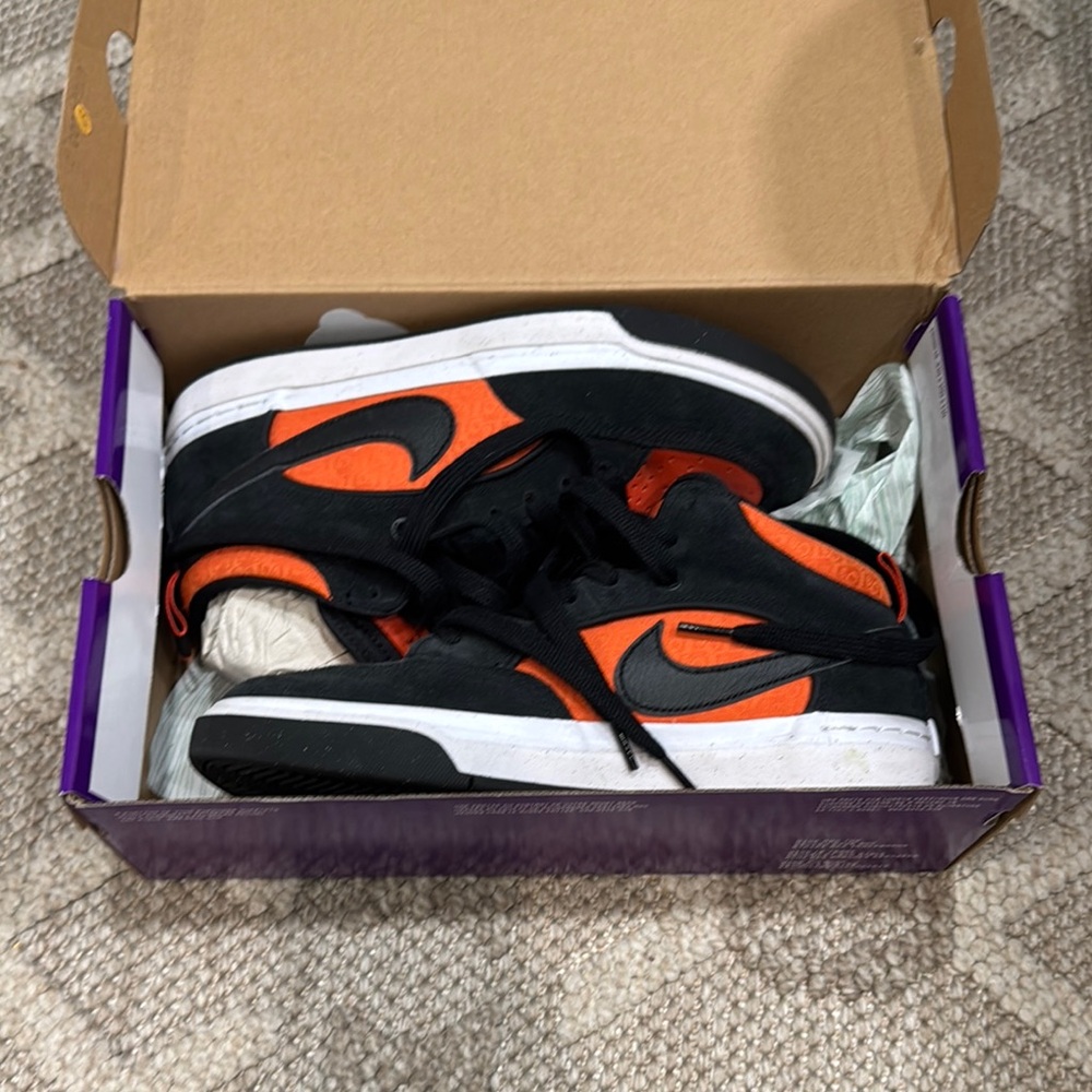 Nike Black and Orange Sneakers with Air Cushioning